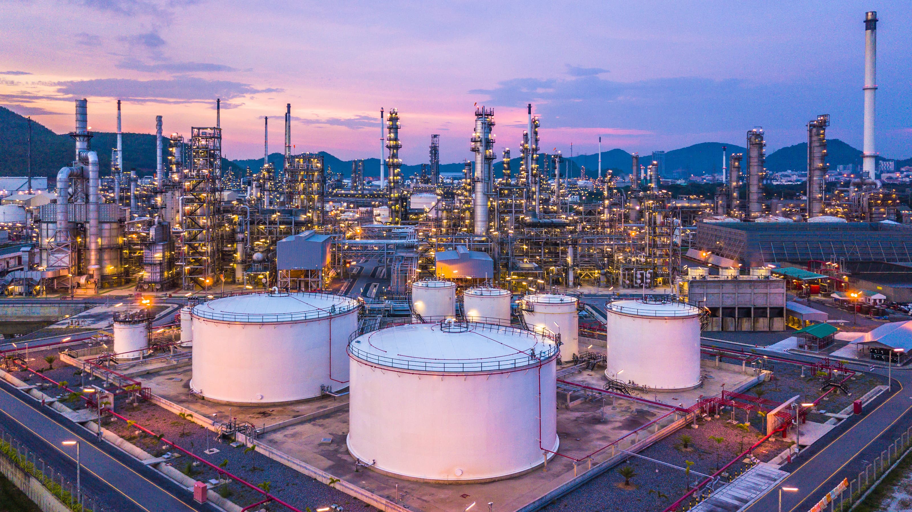 Aerial view of storage tank farm at dusk
